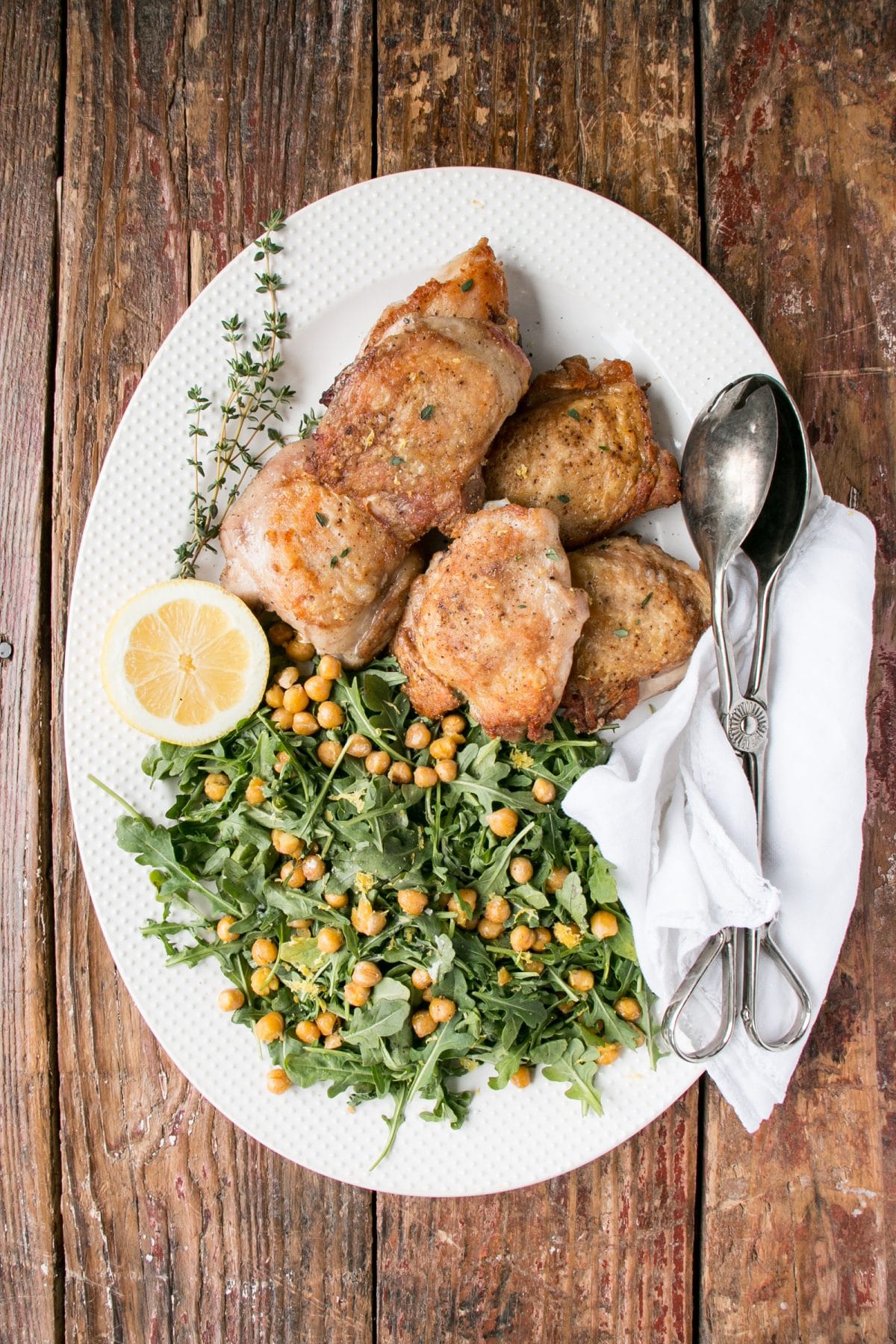 Only a handful of ingredients stand between you and this delicious Chicken with Arugula Chickpea Salad. #chicken #salad #glutenfree 