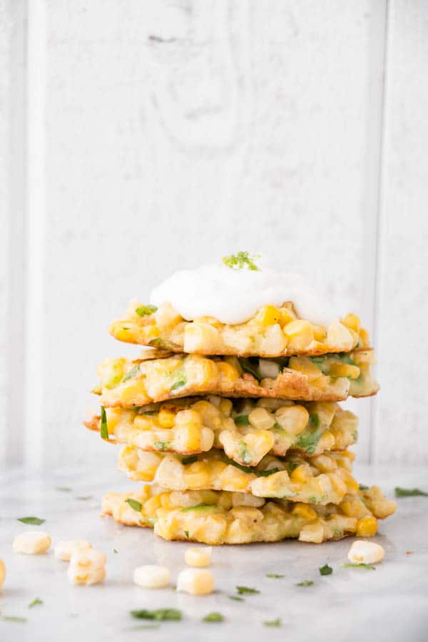 Jalapeño Lime and Corn Fritters are the ultimate end of summer fare. A bit of spice from the jalapeño and zest from the lime.