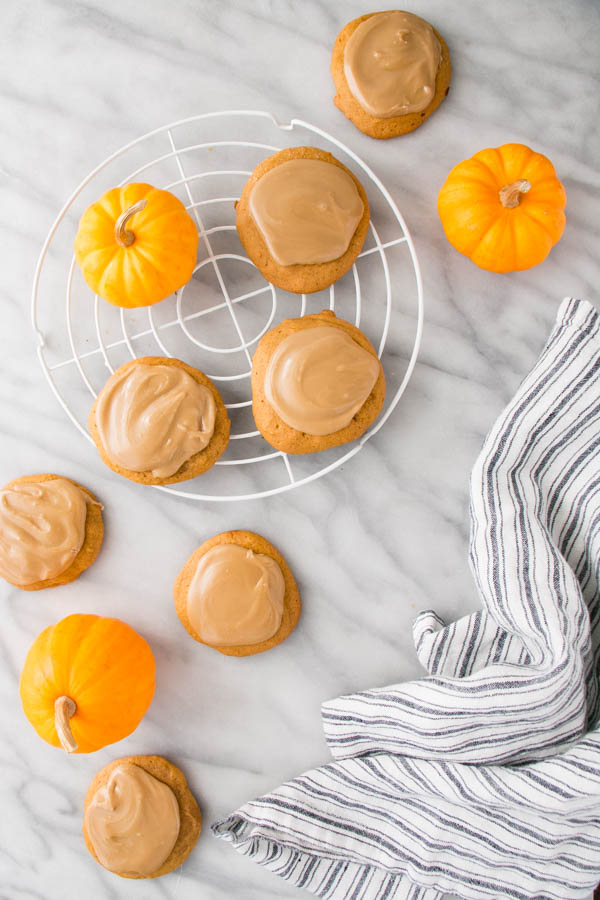 These Maple Glazed Pumpkin Spice Cookies are light with the right amount of "spice" and a delicious maple glaze!
