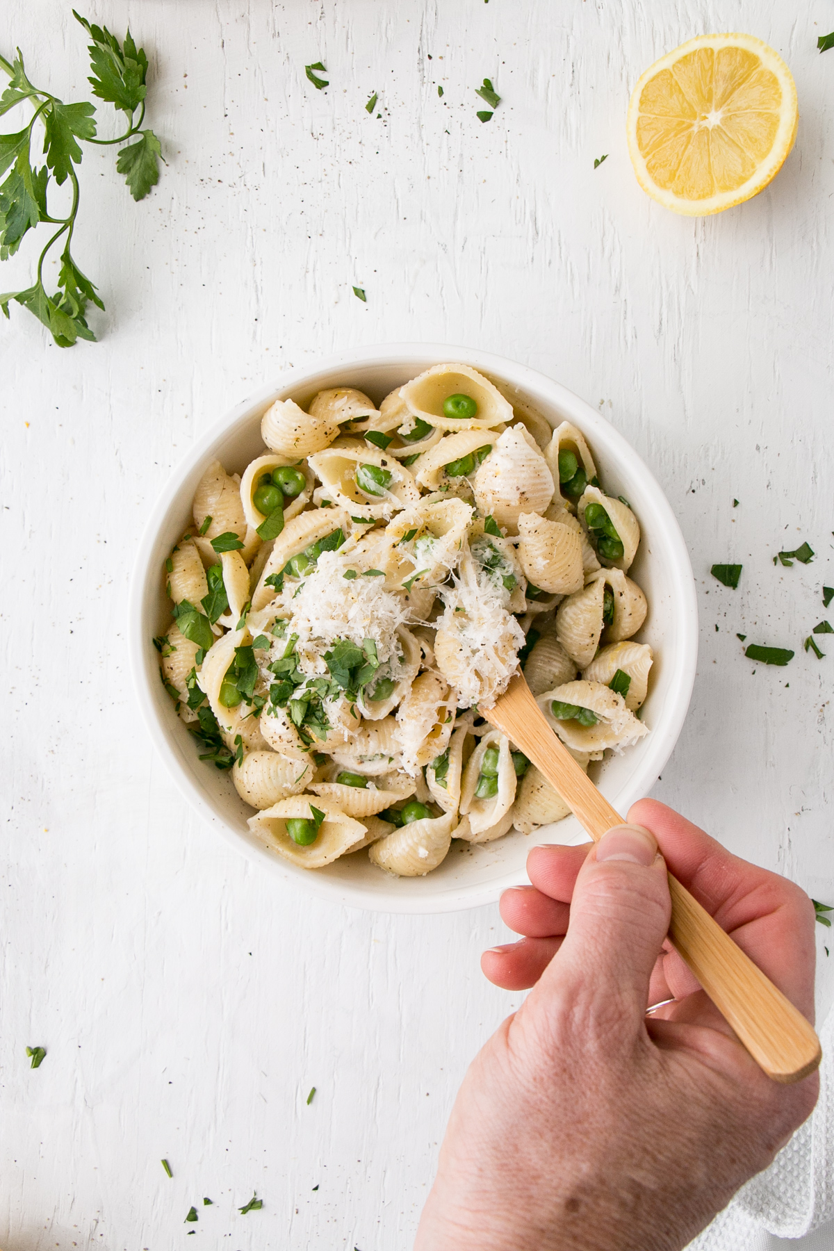 Lemon Pepper Alfredo with Peas in a white bowl