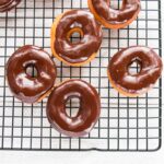 Pumpkin Spice Donuts are an easy and quick donut recipe. Paired with a chocolate glaze, because chocolate and pumpkin together are everything.