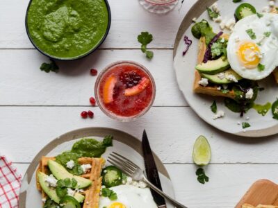Savoury Mexican Waffles are the answer to all your brunch needs. Filled with corn, cilantro and feta, top with an egg and salsa verde! #waffles #brunch