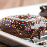 Baked Double Chocolate Donuts with a fudgy cake donut and the best chocolate glaze. #donuts