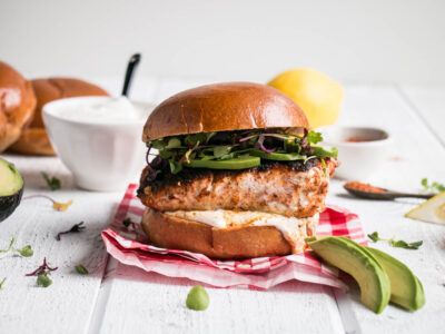 Blackened Harissa Halibut Burger is a dream of a fish burger. Perfectly spiced with a harissa blackened halibut burger, with a cooling lemon yogurt, all on a delicious brioche bun.