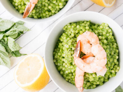 spinach pesto couscous with prawns on top