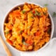 One Pot Pasta with a Creamy Roasted Red Pepper sauce, chunks of Italian Sausage, and tender bites of red bell peppers.