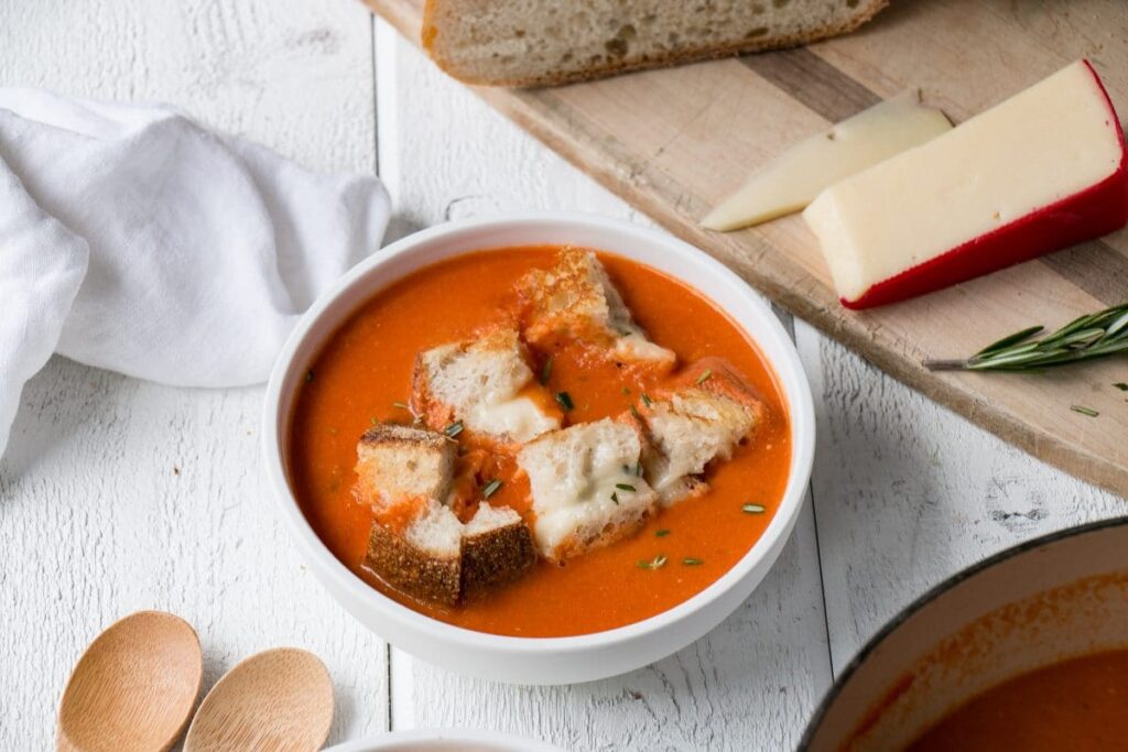 Creamy Tomato Soup with Rosemary Fontina Grilled Cheese Croutons My