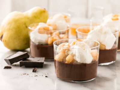 Chocolate Whiskey Pots de Creme with Caramelized Pears and Whipping Cream is an easy and decadent dessert to prepare for date night or make ahead for a showstopper of a dinner party dessert. #datenight #chocolate #dessert