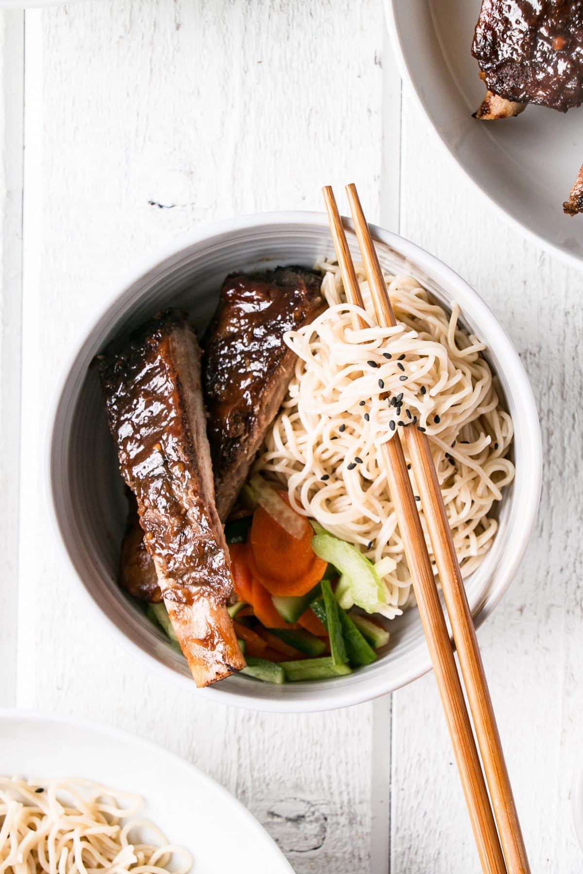 Sticky Asian Ribs made in the Slow Cooker or Instant Pot for 2 truly easy ways to having ribs for dinner! #ribs #slowcookerribs #instantpot #instantpotribs #slowcooker