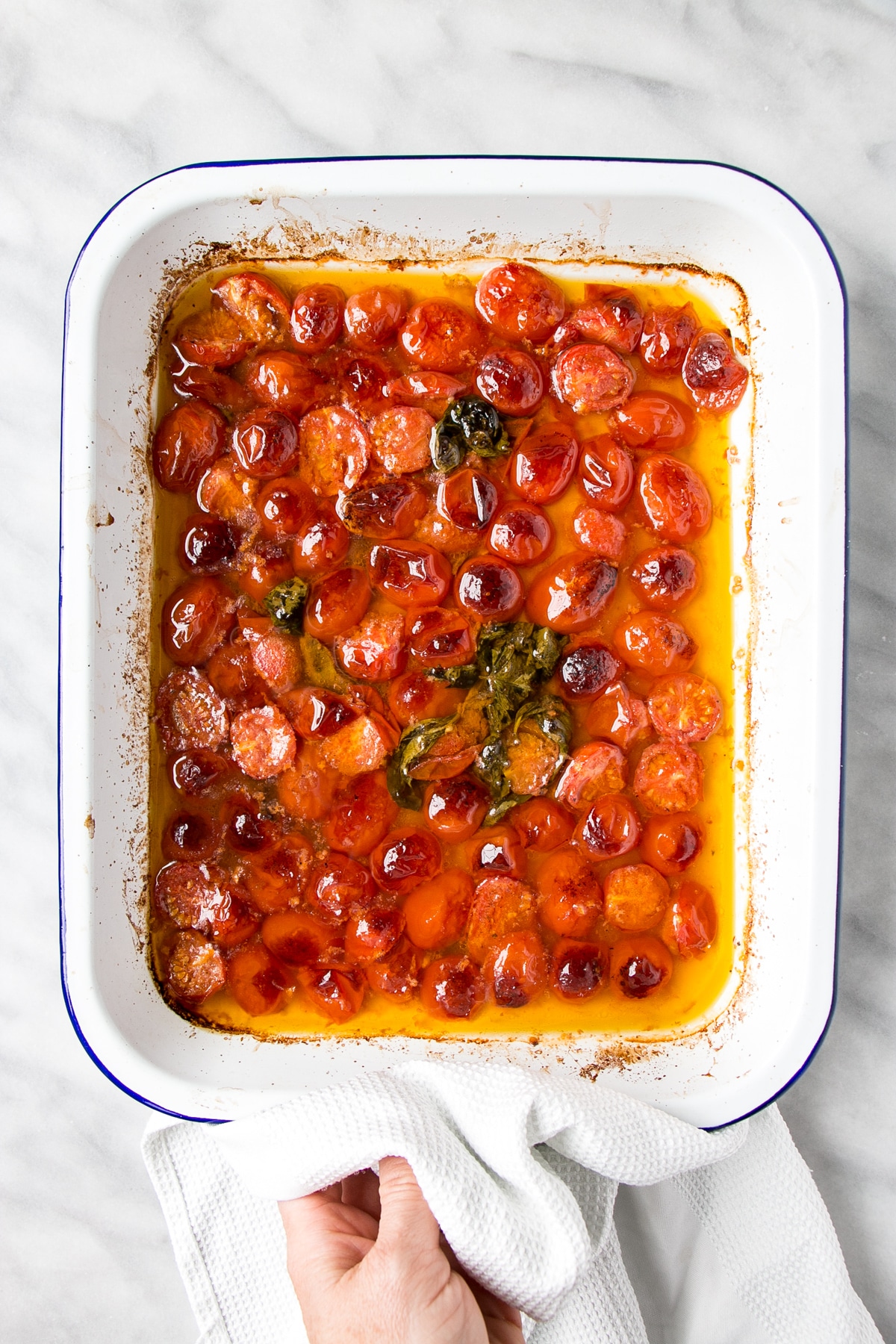 Anchovy and Tomato Sauce in a white baking dish.