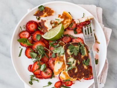 Halloumi and Strawberry Salad on a white plate.