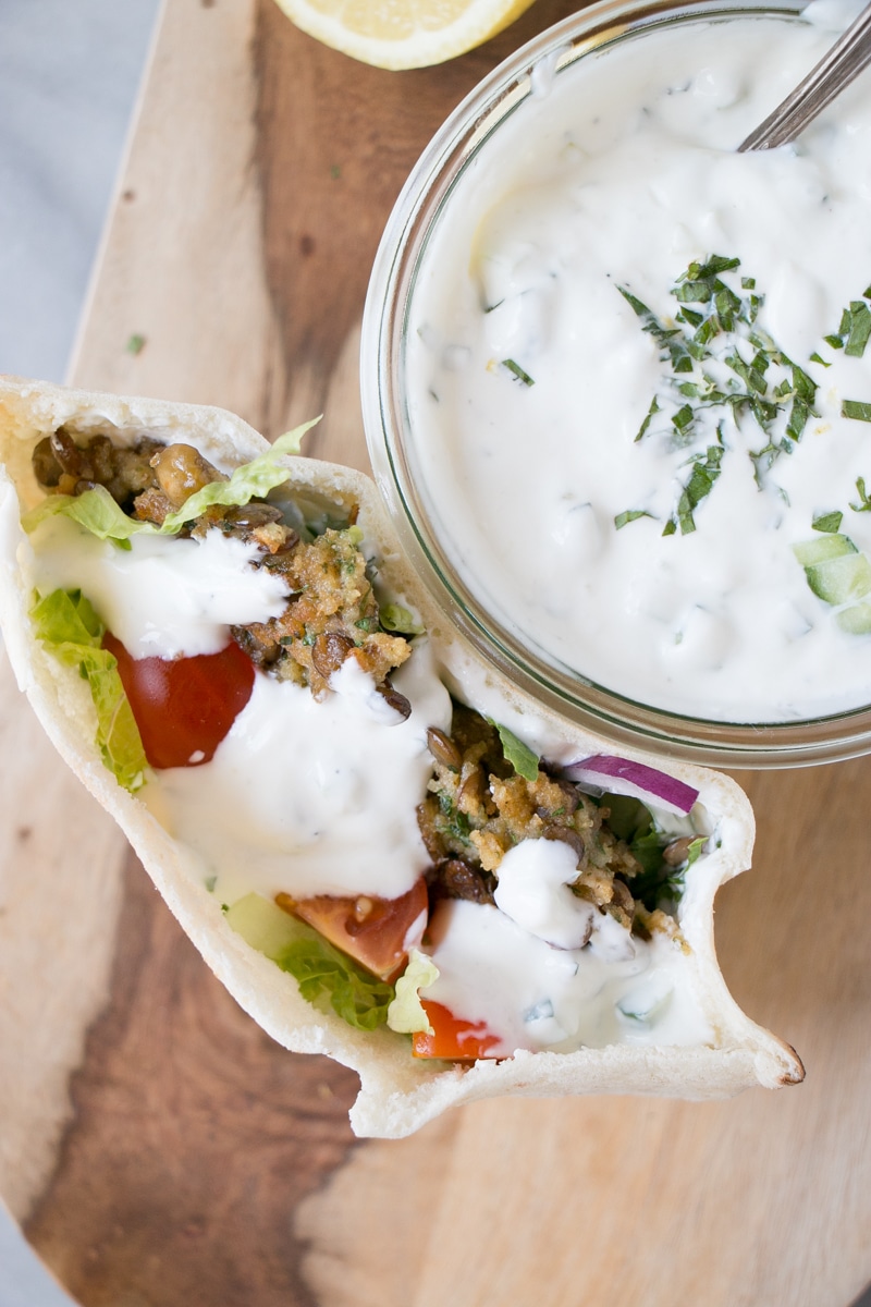 Tzatziki in a jar and will some dollops on top of a pita with veggies. 