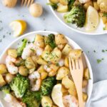 Sheet Pan Shrimp and Potatoes with a bright white background.