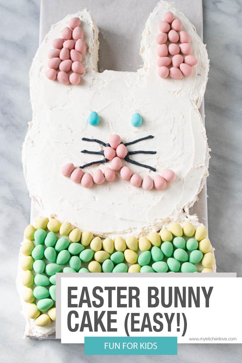 Festively fun, this Easter Bunny Cake is surprisingly easy to make with minimal equipment required! Cute, delicious, and easy make this a no-brainer Easter treat.  via @mykitchenlove